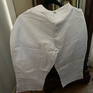 White dress capris with lace applicas at the bottom